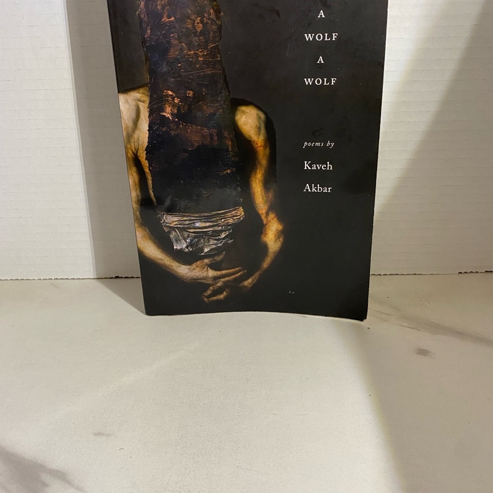 A Wolf A Wolf by Kaveh Akbar
